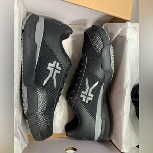 Kuru size 11.5 Medium black and grey.  New.  Never worn.